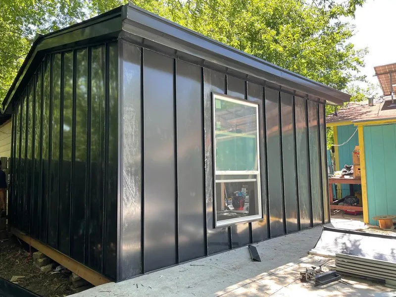 Black standing seam metal wall panels for Roof Inspection in Lebanon